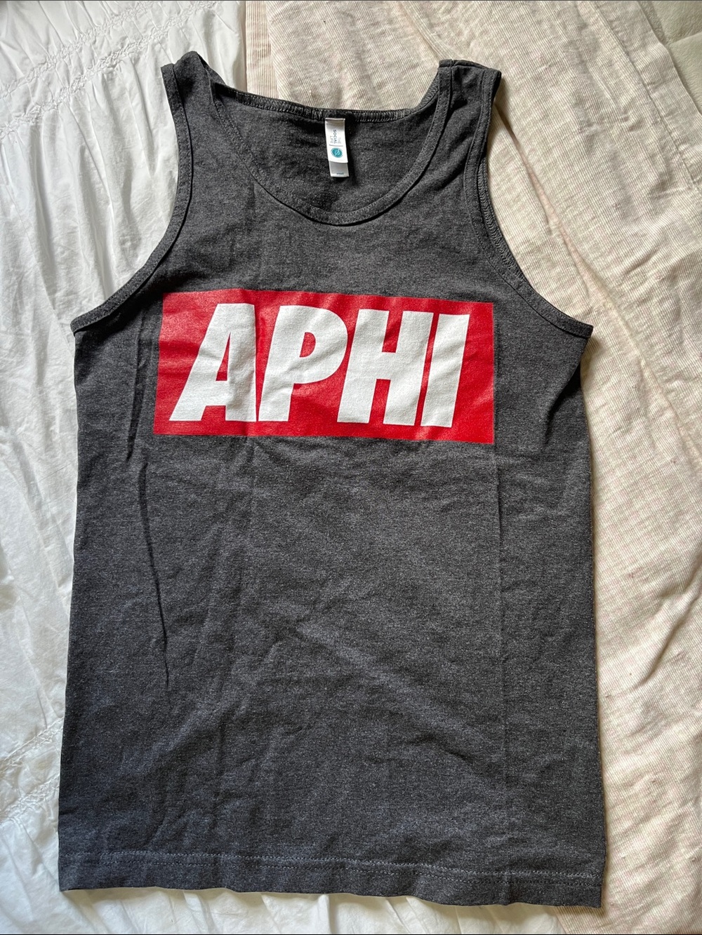 APHI Red Logo Tank Top on Charcoal Gray